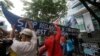 Demonstrators rally at the Chinese Consulate at the financial district of Makati city, The Philippines, to protest China's reclamations of disputed islands off South China Sea, July 3, 2015. The reclamations have strained U.S.-China relations.