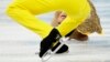 Stefania Berton and Ondrej Hotarek of Italy compete in the team pairs short program figure skating competition at the Iceberg Skating Palace during the 2014 Winter Olympics in Sochi, Feb. 6, 2014.