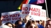 Protesters call for Mississippi Gov. Phil Bryant to veto House Bill 1523, which they say will allow discrimination against LGBT people, during a rally outside the Governor's Mansion in Jackson, Mississippi, April 4, 2016.