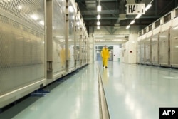 FILE - In this file handout photo taken Nov. 6, 2019, and released by Iran's Atomic Energy Organization shows the interior of the Fordo Uranium Conversion Facility in Qom, in northern Iran.