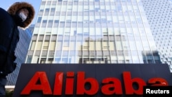 FILE - The logo of Alibaba Group is seen at its offices in Beijing, China, Jan. 5, 2021.