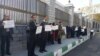 A group of Iranian doctors and their supporters gathered outside Iran's parliament in Tehran on November 26, 2018, to support jailed rights activist and doctor Farhad Meysami. 