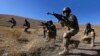 Afghan National Army (ANA) soldiers take part in a training exercise at a military base in Kabul Nov. 23, 2014.