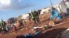 This screenshot from a video posted by the 'White Helmet' Syrian civil defense group shows the aftermath of what opposition groups say was an airstrike at the Kamouna refugee camp.