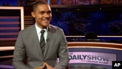 Trevor Noah appears on the set of his new show, "The Daily Show with Trevor Noah," in New York, Sept. 25, 2015.