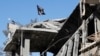 IS Militants Evacuate Last Stronghold in Syria to Government