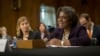 FILE - U.S. Assistant Secretary of State for African Affairs Linda Thomas-Greenfield, right, testifies on Capitol Hill in Washington, January 2014.