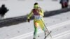 Togo's Mathilde Amivi Petitjean crosses the finish line of the women's 10K classical-style cross-country race at the 2014 Winter Olympics, Thursday, Feb. 13, 2014, in Krasnaya Polyana, Russia.