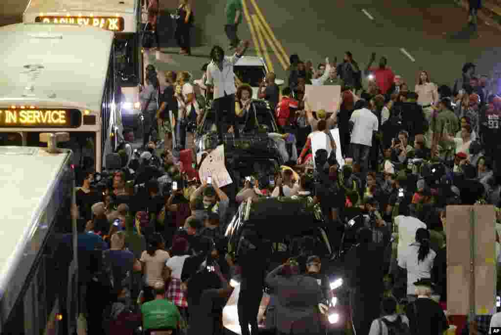 Demonstrators protest Tuesday's fatal police shooting of Keith Lamont Scott in Charlotte, N.C. on Sept. 21, 2016.