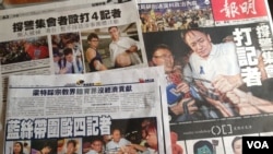 香港媒體報導記者採訪親中團體集會遭遇襲擊（美國之音圖片）