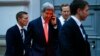 U.S. Secretary of State John Kerry makes a phonecall after a meeting in Vienna, Nov. 21, 2014.