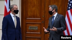 Britain's Foreign Secretary Dominic Raab (L) speaks with U.S. Secretary of State Antony Blinken ahead of their bilateral meeting in London, Britain May 3, 2021 during the G7 foreign ministers meeting.