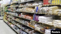 FILE - Food items are seen in a supermarket in Doha, Qatar, June 7, 2017. 
