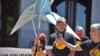 Lam Hong Le, left, speaks at a rally organized by Tsuru for Solidarity, outside California's State Capitol in Sacramento, June 4, 2021, to gather support for a petition seeking a pardon. (Kiyoshi Ina)