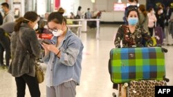 Suasana di bandara internasional Sydney, 16 Maret 2020. 
