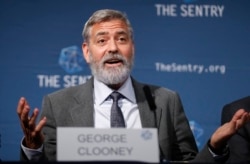 US actor and activist George Clooney speaks at a press conference about South Sudan in London, Thursday, Sept. 19, 2019. The largest multinational oil consortium in South Sudan is "proactively participating in the destruction" of the country, the…