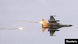 台灣自行研發的“經國”號戰機在台中參加漢光軍演。（2020年7月16日）