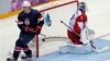 USA forward T.J. Oshie scores in shootout against Russia during men's ice hockey matchup at the 2014 Winter Olympics, Sochi, Feb. 15, 2014.
