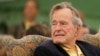 Former U.S. Presidents and former U.S. first ladies Laura Bush, George W. Bush, Bill Clinton, Hillary Clinton, Barack Obama, Michelle Obama, and first lady Melania Trump pose with former U.S. President George H.W. Bush at the funeral of Barbara Bush in Houston.