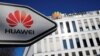 FILE - The logo of Huawei Technologies is pictured in front of the German headquarters of the Chinese telecommunications giant in Duesseldorf, Germany, Feb. 18, 2019. 