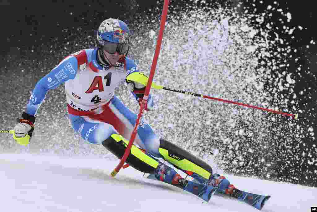 France's Clement Noel speeds down the course during an Alpine ski men's World Cup slalom in Kitzbühel, Austria.