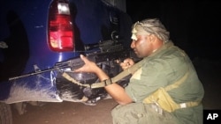 An Iraqi Sunni tribal fighter in Ramadi, the capital of Anbar province, 115 kilometers (70 miles) west of Baghdad, Iraq, early Saturday, May 16, 2015.