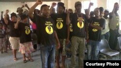 'We are the only free African country that still has a colonial name,' says AZAPO's leader. Members sing protest songs at a recent Johannesburg meeting. (Courtesy AZAPO)